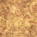 Batik fabric in reptile print in pale gold on an amber background