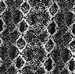 Batik fabric in diamond patterned reptile print in black and white