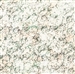 Batik fabric in an abstract mottled print in green and pale pink tones