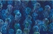 Batik fabric with a deep blue with bright green accents jellyfish print