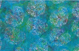 Batik fabric with a sea anenome print in bright blue and green