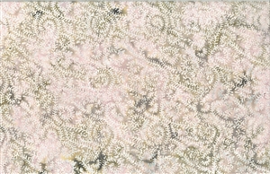 Batik fabric with a swirled seaweed print in pale pink, cream and sage green tones