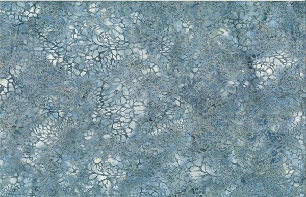 Batik fabric with a sea turtle skin print in denim blue tones