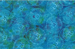 Batik fabric with jellyfish print in blues and greens