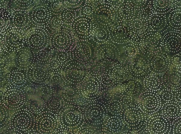 Spiral dot pattern batik fabric on a dark green background.