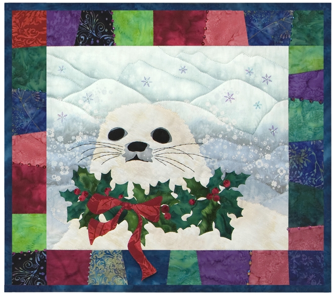 This little seal is decked out in a holly wreath and ready for Christmas!