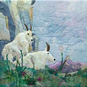 fabric panel with mountain goats lounging on the grass
