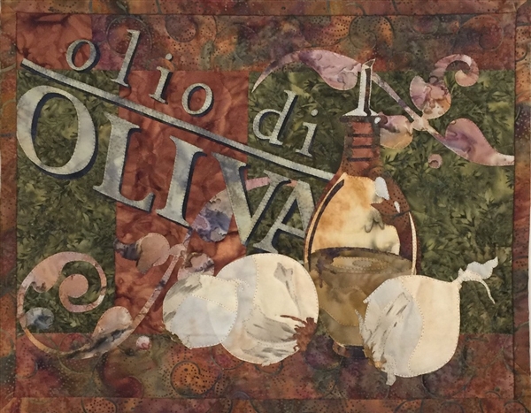 Italian style quilt block celebrates delicious olive oil with a big bottle, and some beautiful bulbs of garlic