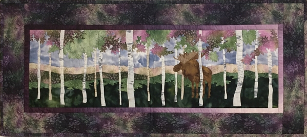 Quilt block of a bull moose jealously, peacefully, guarding his grove of birch trees.