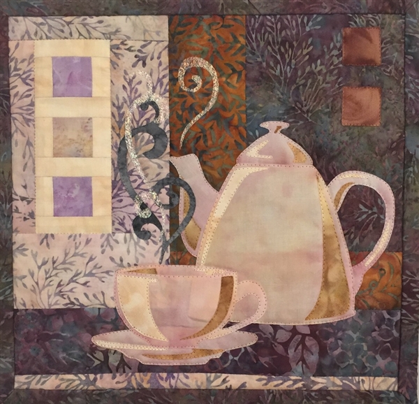Quilt block of a beautiful coffee pot next to a steaming, fresh cup of coffee.