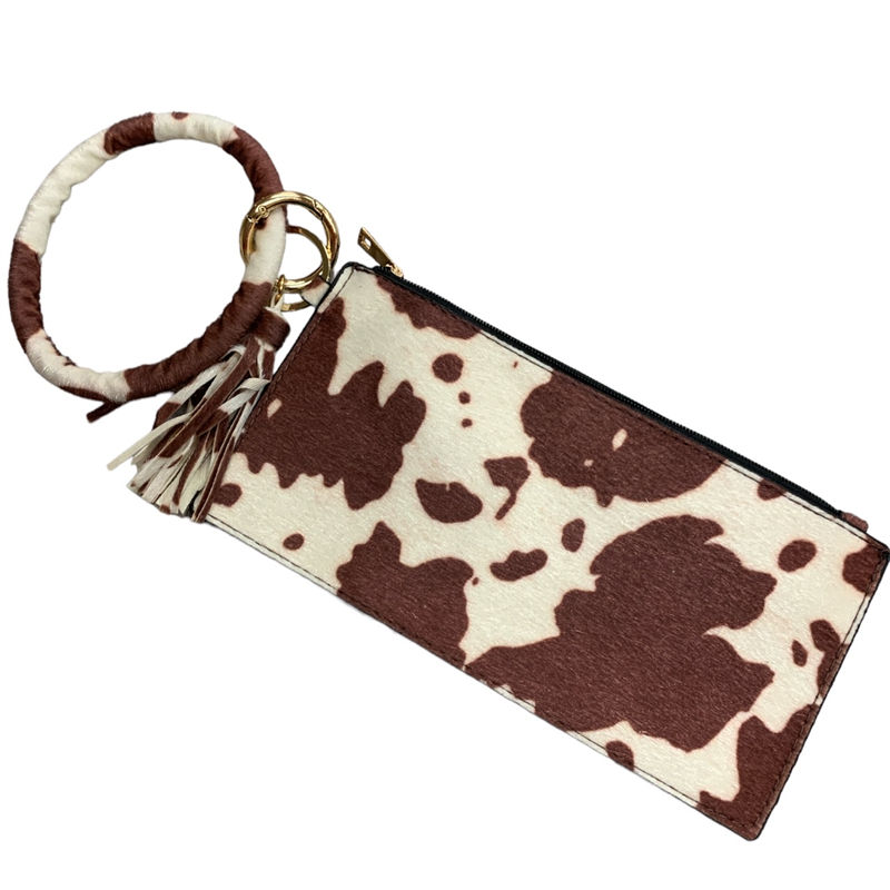 402TN  TAN AND WHITE COW PRINT WRISTLET