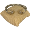 BR826 BRAIDED CLEAR STONES PAVE RHODIUM PLATED BRACELET