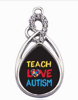 Charm ovalado "TEACH, LOVE, AUTISM" para maestras