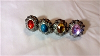 Oval rhinestone metal rings with, stretch bands in pink, amber, blue or red