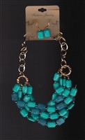 Teal and blue necklace and earring set.