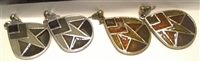 Shield lady's earrings in a charcoal, or brown pattern.