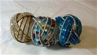 Wire cuff weaved beaded bangles in blue and clear, gold and clear or clear with red, blue, and gold beads.
