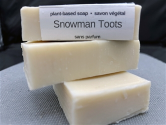 Snowman Toots water-based soap with white base and orange and black swirls, handmade in PEI