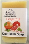 Vibrant Grapefruit Goat Milk Soap bar, showcasing its fresh citrus appearance and natural creamy texture, perfect for an energizing cleanse.