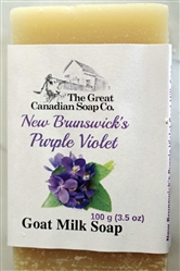New Brunswick Purple Violet Goat Milk Soap bar showcasing its creamy texture and floral essence on a serene background.
