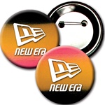 Lenticular button with red, yellow, and black gradient, color changing 3 inch diameter