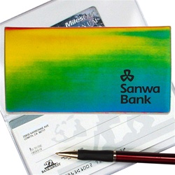 Lenticular checkbook cover with yellow, blue, and green, color changing with