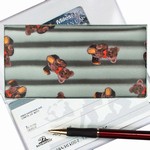 Lenticular checkbook cover with teddy bears on a black and white striped background, depth