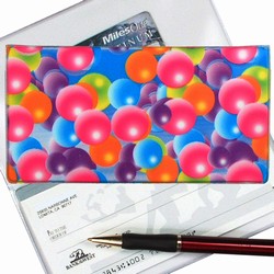 Lenticular checkbook cover with pink, blue, orange, and green bubbles, depth