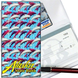 Lenticular checkbook cover with purple and white dolphins on a blue background, depth