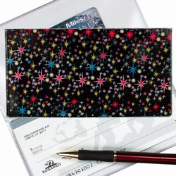 Lenticular checkbook cover with outer space stars and planets on a deep black background, depth