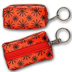 Lenticular purse key chain with red spinning wheels on white background, animation