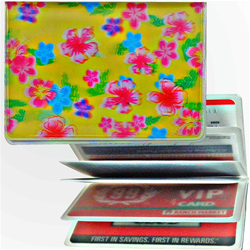 Lenticular credit card ID holder with pink, blue, and green flowers on a yellow background, depth