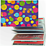 Lenticular credit card ID holder with pink, yellow, blue, and green balls on a purple background, depth