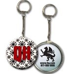 Lenticular key chain with black spinning wheels on white background, animation