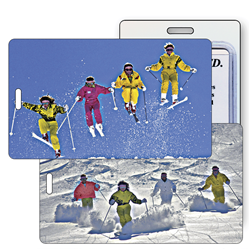 Lenticular luggage tag with group of snow skiiers jumping off a freshly powdered mountain slope, flip