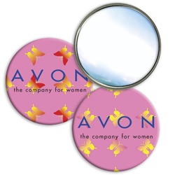 Round lenticular mirror with yellow and red butterflies on a pink background