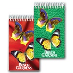 Lenticular mini notebook with large yellow butterflies, background switches from green to red, flip