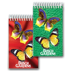 Lenticular mini notebook with large yellow butterflies, background switches from green to red, flip