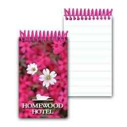 Lenticular mini notebook with bed of pink flowers inside a beautiful spring garden, depth