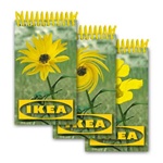 Lenticular mini notebook with yellow flower in a green field changes to a different sunflower, animation