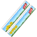 Lenticular ruler with growing bright yellow flowers in a grassy spring field in clear blue skies, animation