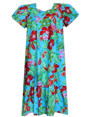 mud-calf muumuu dress with a vividly colored print containing hibiscus and bird of paradise flowers, surrounded by green foliage.