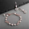 Mariell Wholesale Ivory Pearl and Cubic Zirconia Bridal Bracelet and Earrings Set in Rose Gold