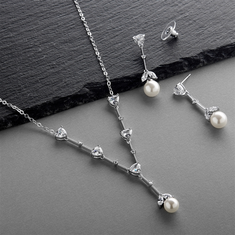 Mariell Wholesale Cubic Zirconia Trillion and Soft White Pearl Bridal Necklace and Earrings Set