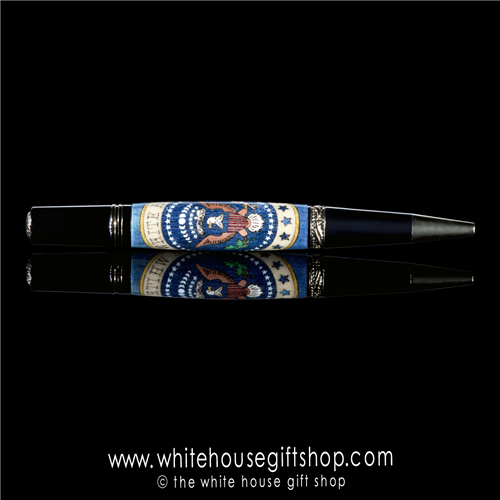 The White House custom wood pen is made up of 131 individually cut pieces. The 131 pieces are assembled one at a time like a jig saw puzzle, sanded with 14,000 grit followed by fifteen individual polishes and wax. From the White House Gift Shop.