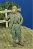 D-Day 35218 - US Paratrooper giving chocolate bar, 1944-45