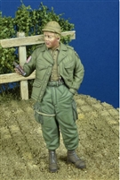 D-Day 35218 - US Paratrooper giving chocolate bar, 1944-45