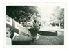 German Soldier Sitting on the Tail of a Messerschmitt Bf-109E, Original WW2 Photo