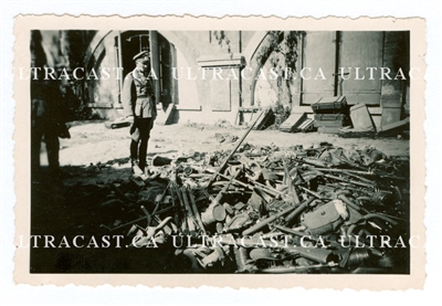 German Officer Looks at Pile of Captured Polish Helmets and Equipment, Poland 1939, Original WW2 Photo