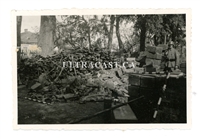 German Soldier with Stockpile of Captured Russian Small Arms and Ammo, Original WW2 Photo